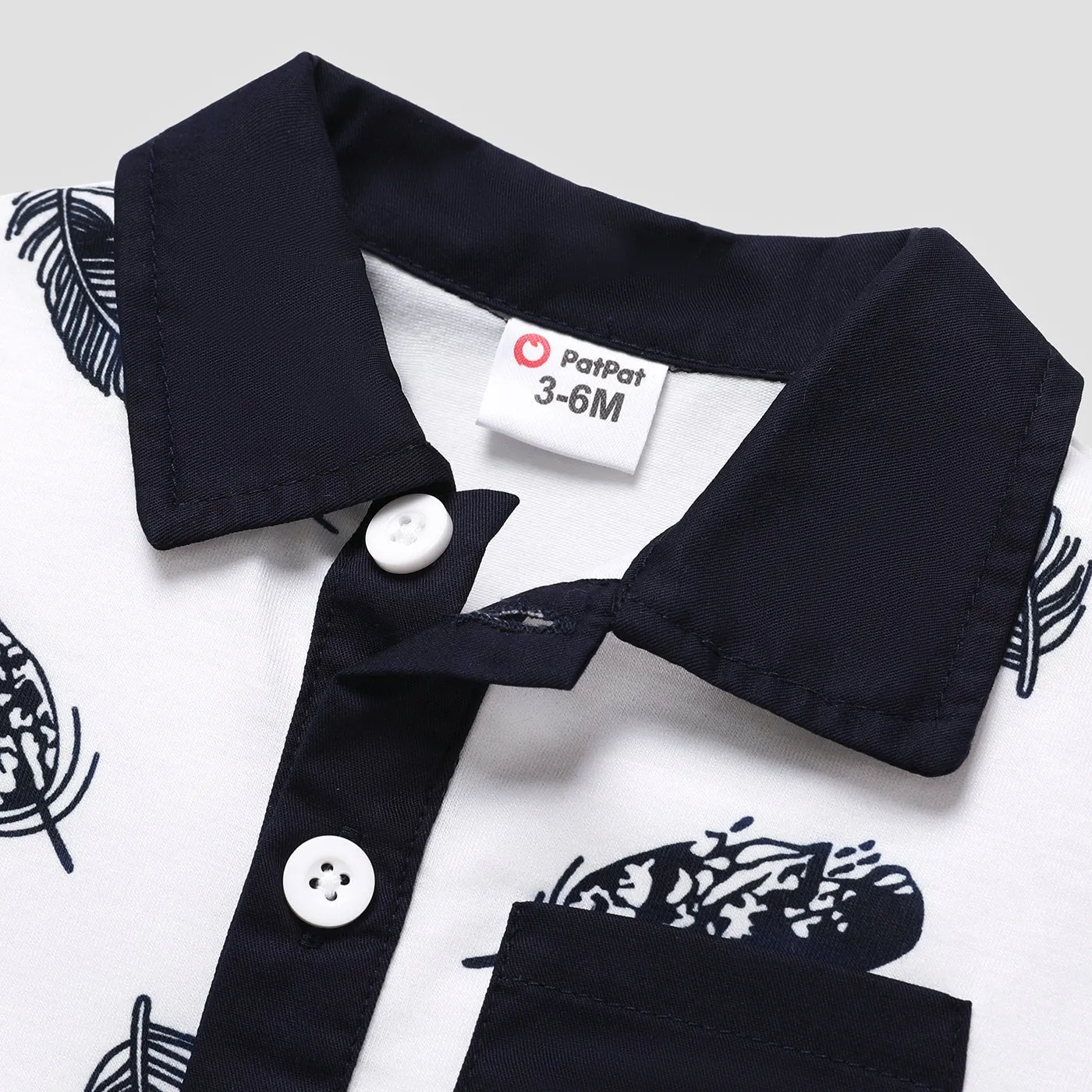 2pcs Baby Boy 100% Cotton Solid Shorts and Allover Feather Print Contrast Collar Short-sleeve Polo Shirt Set