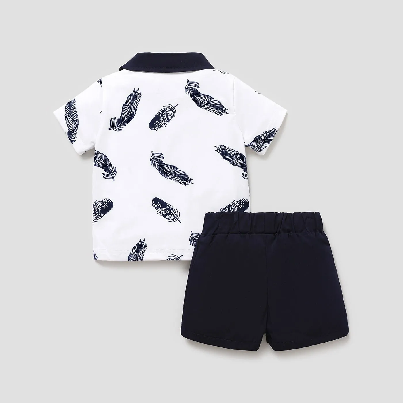 2pcs Baby Boy 100% Cotton Solid Shorts and Allover Feather Print Contrast Collar Short-sleeve Polo Shirt Set