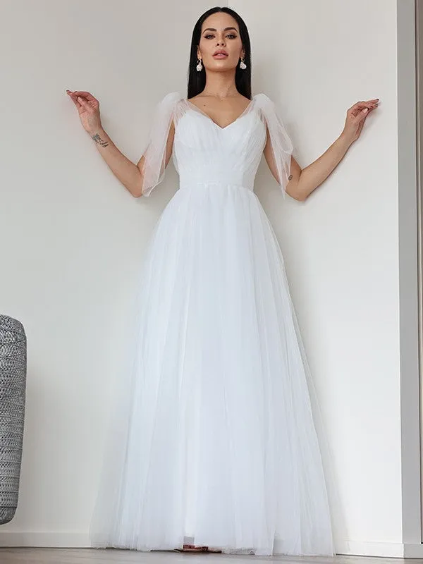 A-Line/Princess Tulle Ruffles V-neck Sleeveless Floor-Length Wedding Dresses