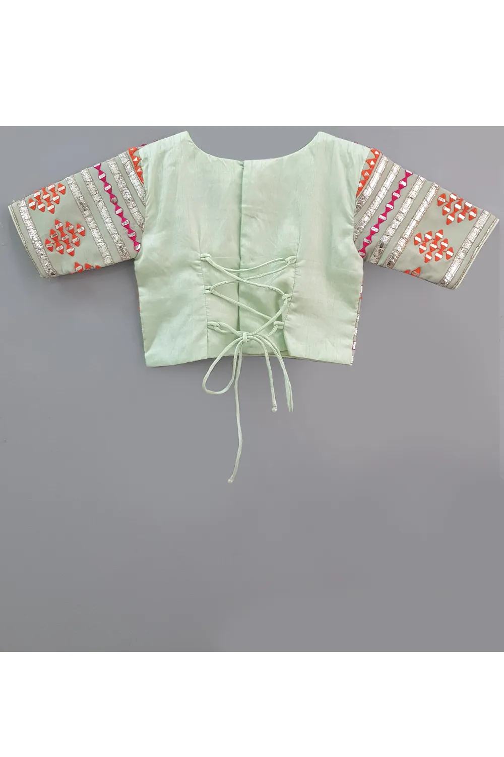 Sea green embroidered choli and lehenga with frilly dupatta