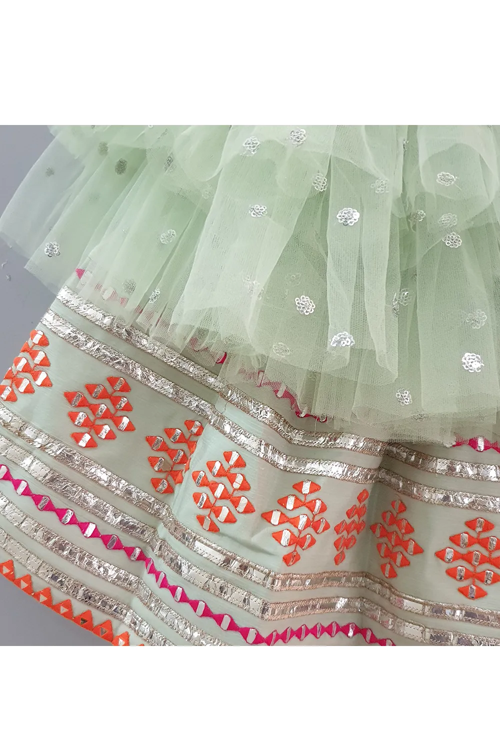 Sea green embroidered choli and lehenga with frilly dupatta